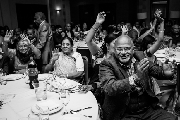 Wedding guests welcoming the bride and groom| Confetti.co.uk