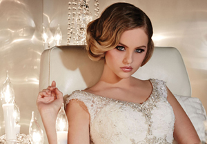 Glamourous bride and white appliqué wedding dress | Confetti.co.uk