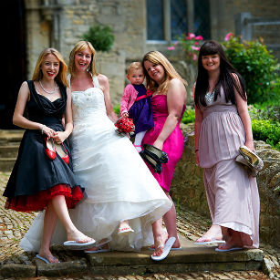 Bride and bridesmaids in wedding flip flops