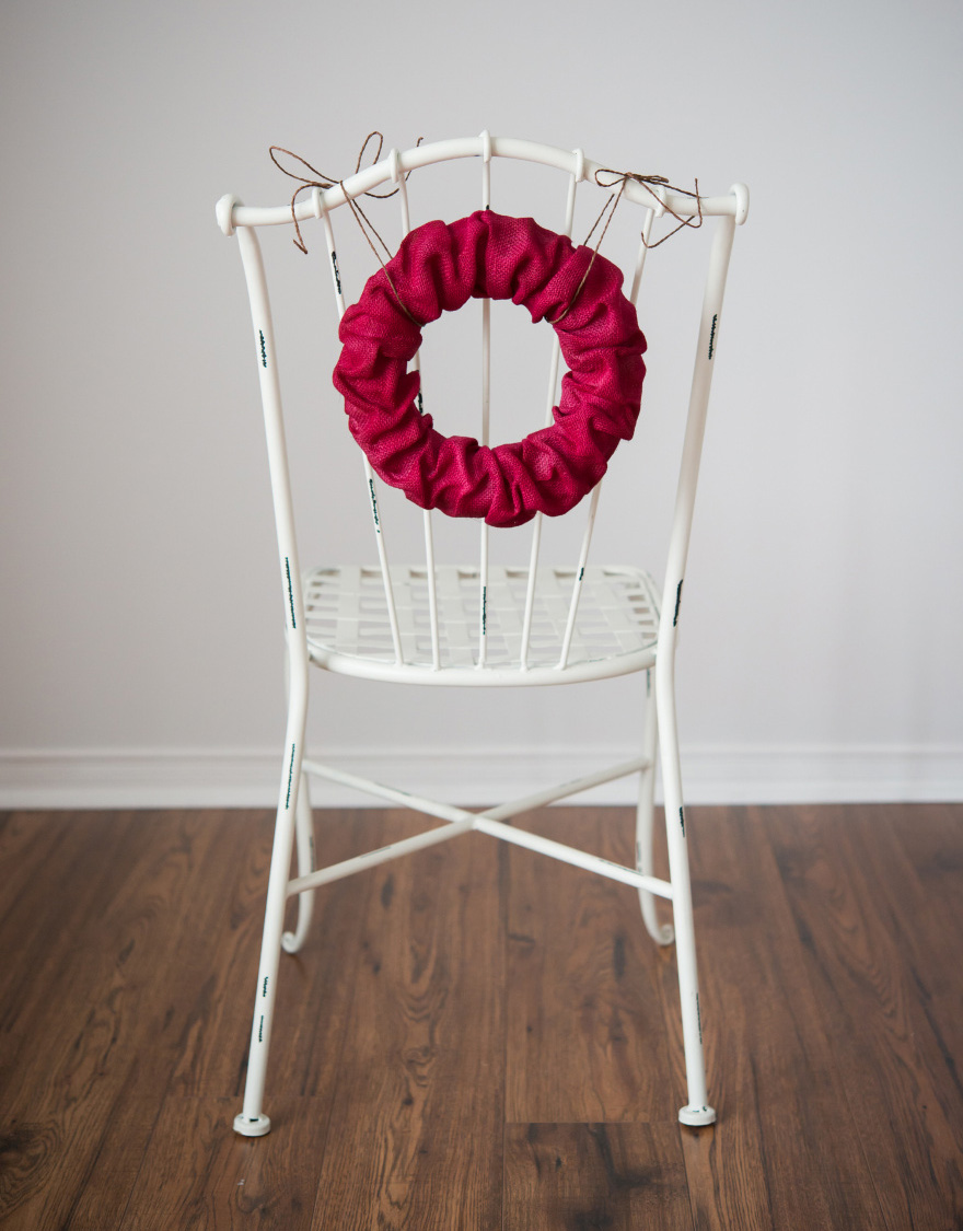 Red Wreath Chair Back - Burlap wreath as a chair back decoration | Confetti.co.uk