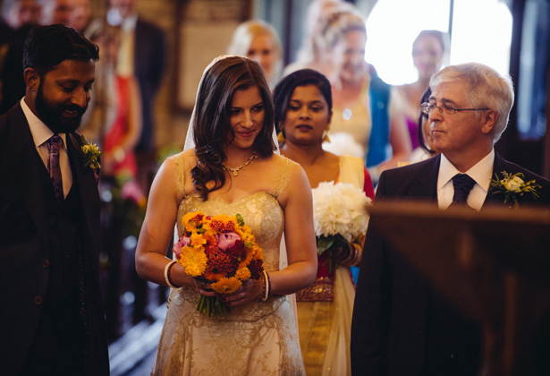 The bride and groom together at the altar | Francesca & Arun's Fusion Real Wedding | Confetti.co.uk  