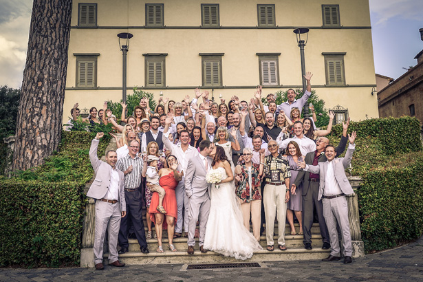 Group shot of the bride and groom with their wedding guests | Morgan and James Real Wedding By Infinity Weddings | Confetti.co.uk