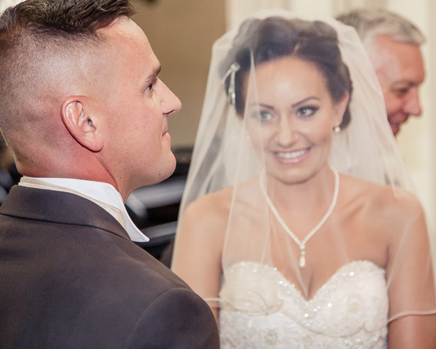 The bride and groom at their ceremony | Becki and Rob’s Real Wedding By Jenny Martin Photography | Confetti.co.uk