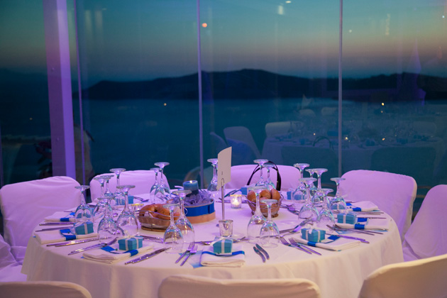 Blue and white wedding table decor | Tiffany blue boxed wedding favours | Wedding reception at the Pantheon villas Santorini | Dasha and Steve's Real Wedding In Greece | Marryme in Greece | Confetti.co.uk