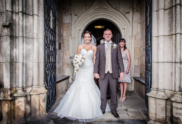 The newlyweds outside the church | Becki and Rob’s Real Wedding By Jenny Martin Photography | Confetti.co.uk