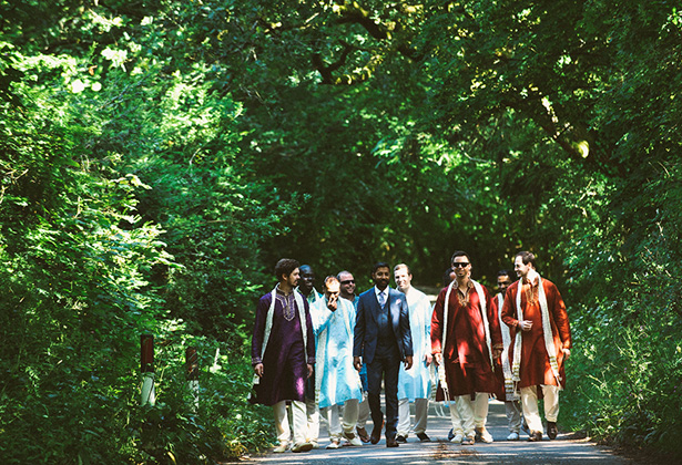 Groom in a blue Paul Smith suit | Groomsmen in traditional Asian wedding sherwanis | Francesca & Arun's Fusion Real Wedding | Confetti.co.uk  