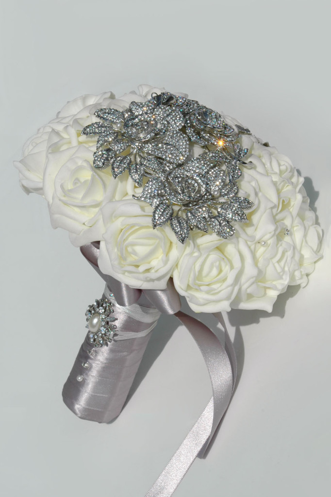 Daina, an ivory rose brooch bouquet from Silk Blooms | Confetti.co.uk