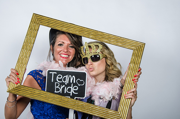 Wedding Worth Selfie \ Wedding Guests having fun with vinatge wedding props | Confetti.co.uk 