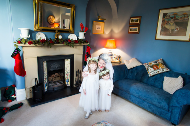 Bride with her flower girls | Abigail and Chris's Real Christmas Wedding | Confetti.co.uk 