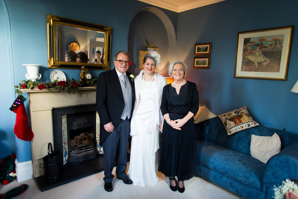 Bride with her parents | Abigail and Chris's Real Christmas Wedding | Confetti.co.uk 