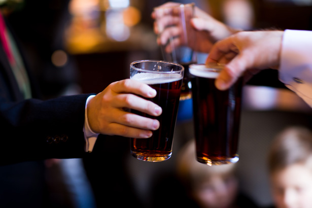 Grooms and groomsmen having a drink before the ceremony | Abigail and Chris's Real Christmas Wedding | Confetti.co.uk 