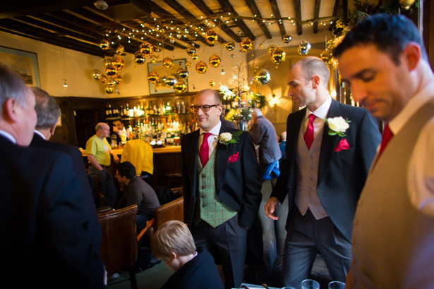 Grooms and groomsmen having a drink before the ceremony | Abigail and Chris's Real Christmas Wedding | Confetti.co.uk 