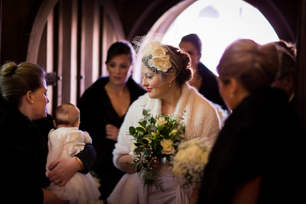 Bride with her bridal party arriving at the venue | Abigail and Chris's Real Christmas Wedding | Confetti.co.uk 