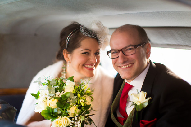 The newlyweds leaving the church | Abigail and Chris's Real Christmas Wedding | Confetti.co.uk 