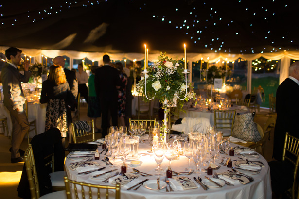 Marquee wedding reception with Christmas themed wedding decor | Abigail and Chris's Real Christmas Wedding | Confetti.co.uk 