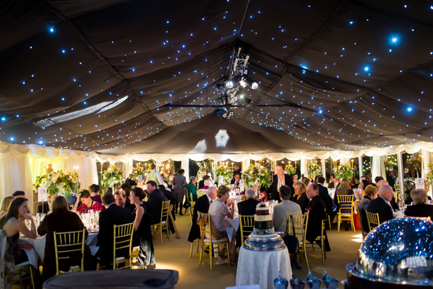 Wedding marquee with black star cloth | Abigail and Chris's Real Christmas Wedding | Confetti.co.uk 