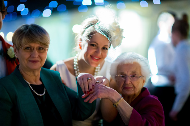 Bride, her mum and gran with their wedding rings | 3 generations of married women | Abigail and Chris's Real Christmas Wedding | Confetti.co.uk 