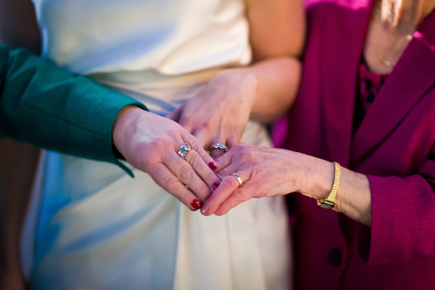 Bride, her mum and gran with their wedding rings | 3 generations of married women | Abigail and Chris's Real Christmas Wedding | Confetti.co.uk 