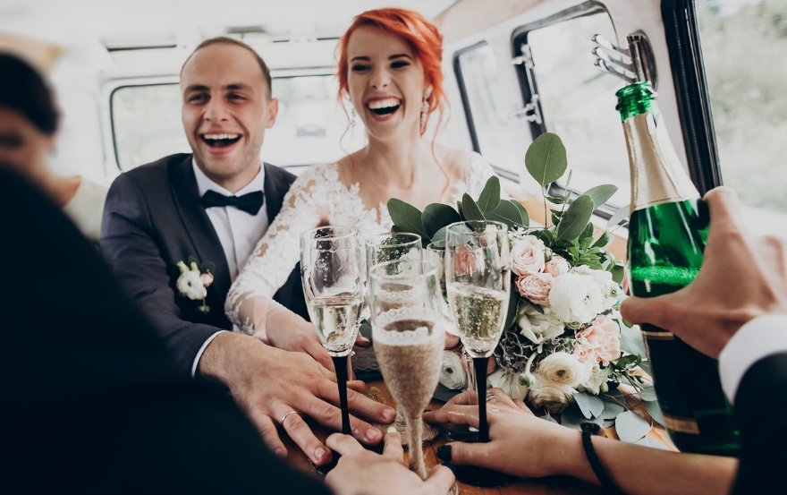 Bride and groom with champagne