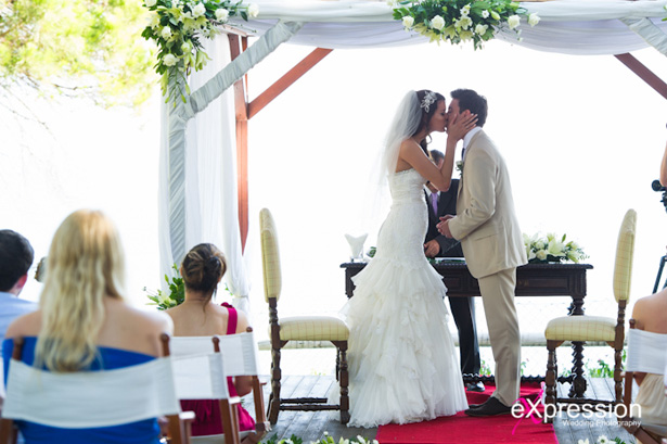 The first kiss as husband and wife |Wedding ceremony at the Sheraton Algarve Hotel, in the Algarve, Portugal.| Debora and James’s real destination wedding | Confetti.co.uk