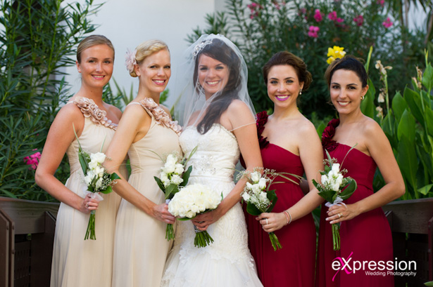 The bride with her 4 bridesmaids | Bridesmaids in Champagne and burgundy dresses |Wedding ceremony at the Sheraton Algarve Hotel, in the Algarve, Portugal.| Debora and James’s real destination wedding | Confetti.co.uk