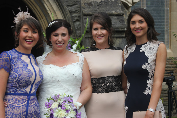 Bride with her female wedding guests | Purple themed wedding| Rhiannon & Michael's Real Wedding | Confetti.co.uk