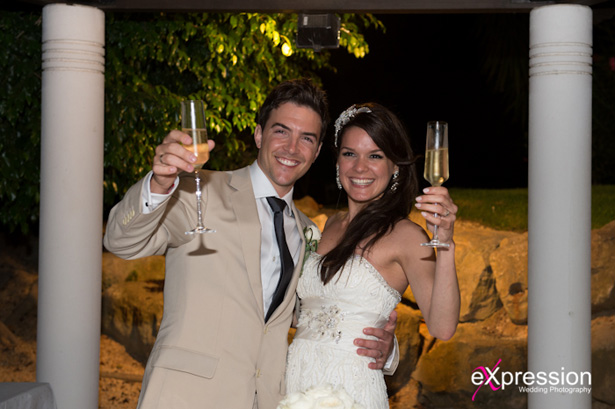 Newlyweds toasting their marriage | Sheraton Algarve Hotel, in the Algarve, Portugal| Debora and James’s real destination wedding | Confetti.co.uk