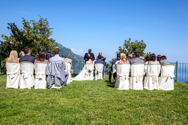 The bride and groom together at the ceremony in Ravello, Italy | Outside wedding ceremony ideas | Leanne and Chris's Real Italian Wedding | Confetti.co.uk