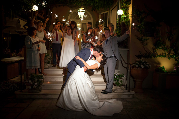 Wedding guests with sparklers | Fun wedding ideas | Leanne and Chris's Real Italian Wedding | Confetti.co.uk