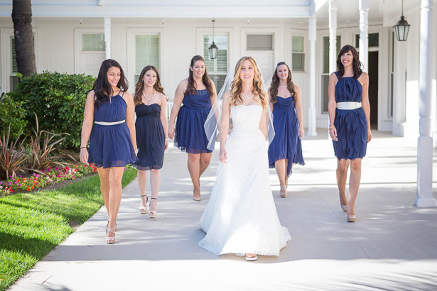 The bride in her strapless lace wedding dress | Bridesmaids in royal blue chiffon short dress | Crystal & Giampaolo California Real Wedding |Destination Wedding America | Confetti.co.uk 