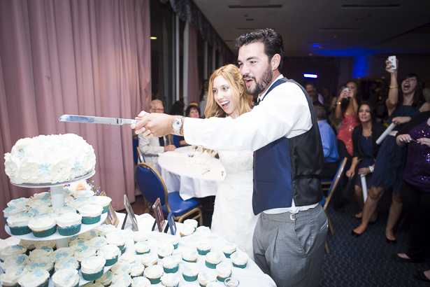 Bride and groom cutting their wedding cake | Crystal & Giampaolo California Real Wedding |Destination Wedding | Confetti.co.uk 