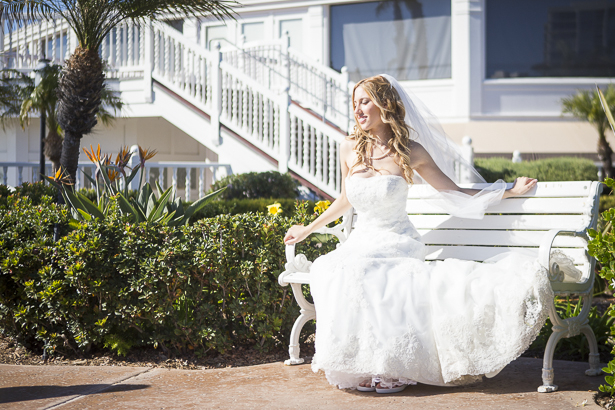 Bride sitting on the bench by the beach | Crystal & Giampaolo California Real Wedding |Destination Wedding America | Confetti.co.uk  