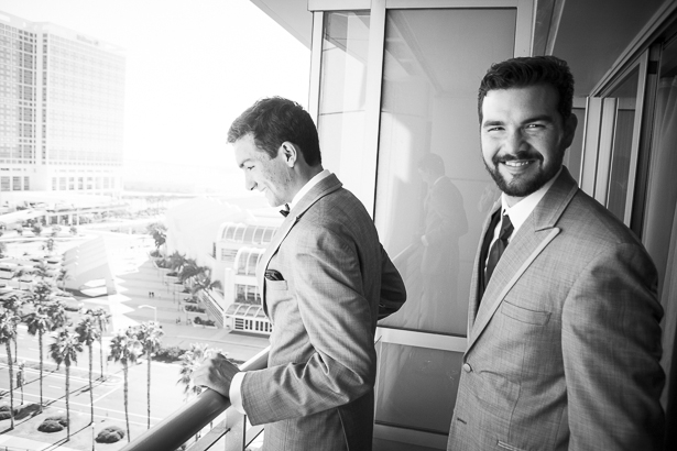 Groom and his best man ready for the wedding standing on the balcony | Crystal & Giampaolo California Real Wedding |Destination Wedding America | Confetti.co.uk 