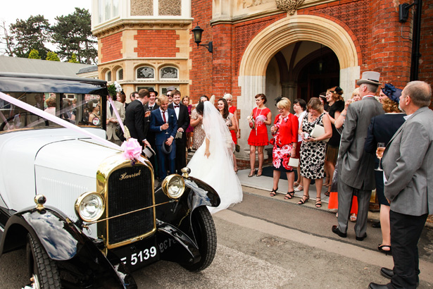  Bride and groom arriving at the venue in a vintage car | Wedding transport ideas | Shasha and James real wedding | 1920’s Great Gatsby Wedding Confetti.co.uk 