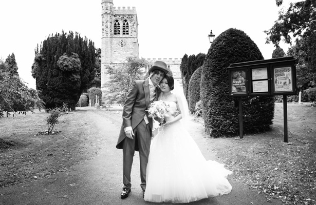  The newlyweds outside the church |Wedding ceremony at St Marys Church, Bletchley | Shasha and James real wedding | 1920’s Great Gatsby Wedding Confetti.co.uk 