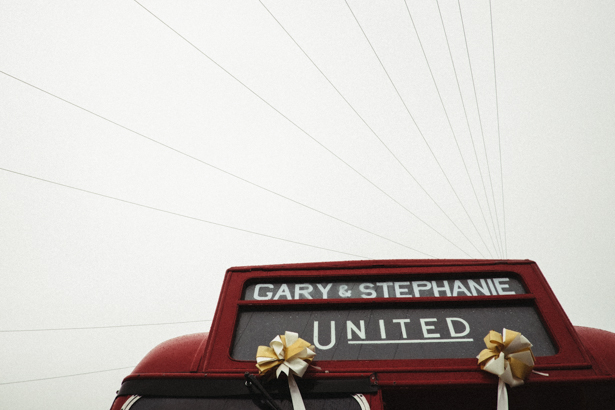 Personalised wedding message on the vintage red London bus | Fun wedding ideas | Steph and Gary's Real Garden Wedding | Confetti.co.uk 