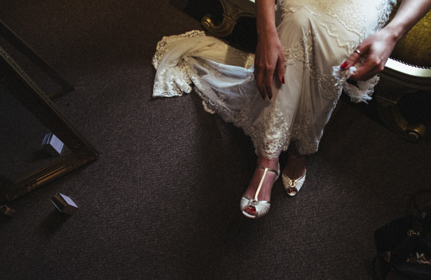 Bride in her lace wedding dress from Monsoon and white pep toe shoes| Steph and Gary's Real Garden Wedding | Confetti.co.uk 