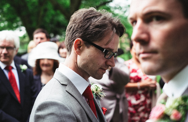 The groom waiting for the bride | Garden wedding ideas | Steph and Gary's Real Garden Wedding | Confetti.co.uk 