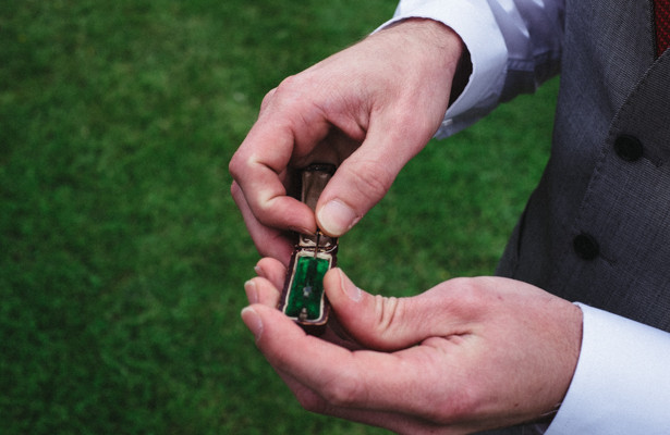 Groom holding a vintage ring box | Steph and Gary's Real Garden Wedding | Confetti.co.uk 