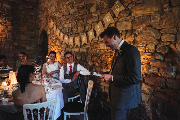 The best man speech | Bride and groom look on as the best man makes his speech | Vintage wedding ideas | Steph and Gary's Real Garden Wedding | Confetti.co.uk 