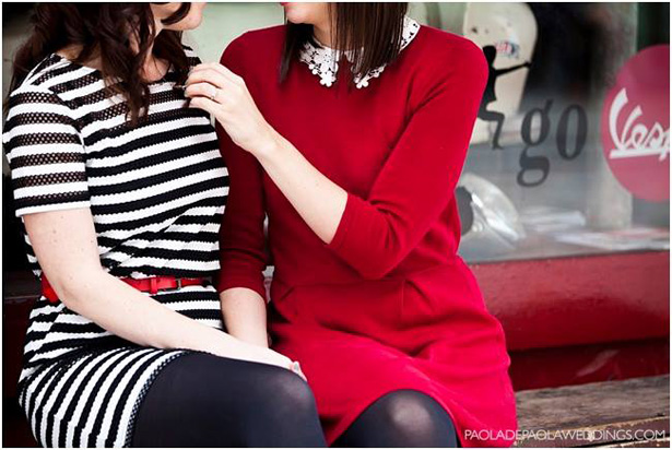 The  brides to be outside the coffee shop | Red peter pan collar dress | Black and white stripped dress with red belt | Engagement shoot ideas | Confetti.co.uk  