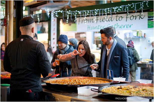 Kim and Dan’s Real Engagement | Engagement shoot idea in London | Bride to be tasting street food |  # London #Urban #Engaged #Engagement #Idea | Confetti.co.uk 