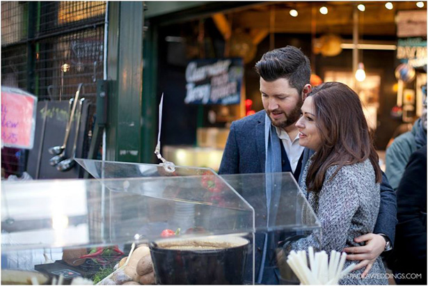 Kim and Dan’s Real Engagement | Engagement shoot idea in London | Couple walking through Borough market  | # London #Urban #Engaged #Engagement #Idea  | Confetti.co.uk 