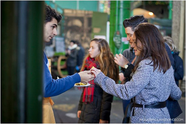 Kim and Dan’s Real Engagement | Engagement shoot idea in London | Couple walking through Borough market | # London #Urban #Engaged #Engagement #Idea | Confetti.co.uk 