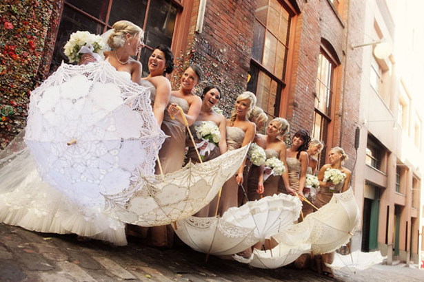 Bridesmaids Posing with Parasols | Confetti.co.uk