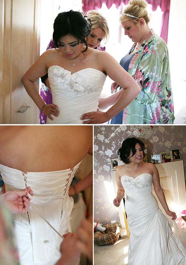 Bridesmaids helping the bride get readying | Sophie & Chris's real wedding | Confetti.co.uk