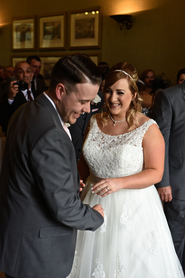 Laura and Daniel share a laugh during their ceremony