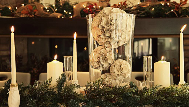 Rustic pine boughs and silver accents make for a perfect winter wedding decor | Confetti.co.uk