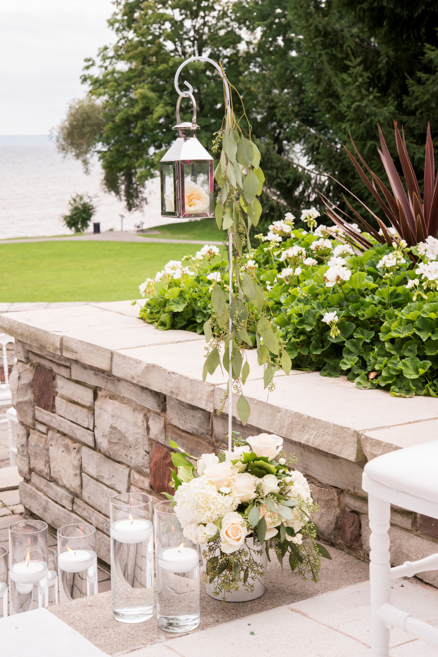 Silver Lantern on Shepherd's Crook Wedding Aisle Decoration Ideas | Confetti.co.uk