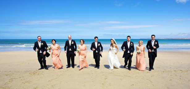 Wedding party on the exclusive Blue Flag beach at Carbis Bay Hotel & Estate.